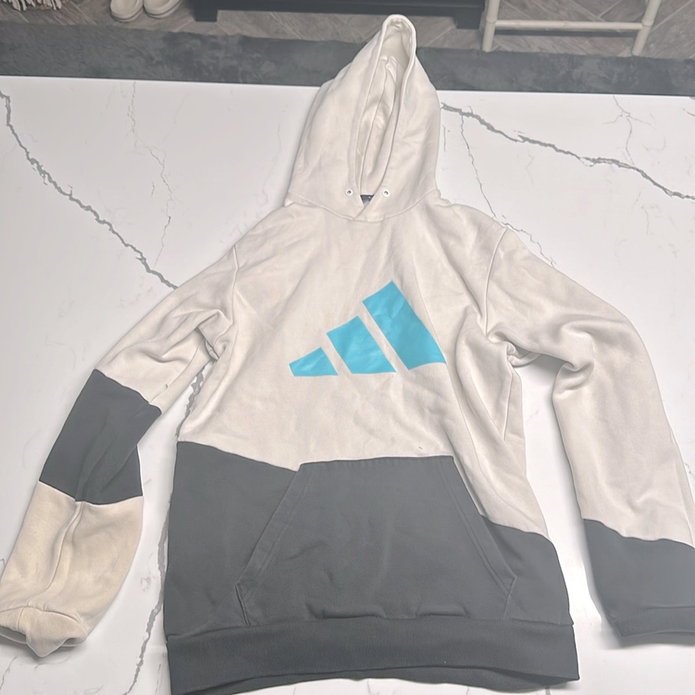 I am selling this white and black sweatshirt from addidas